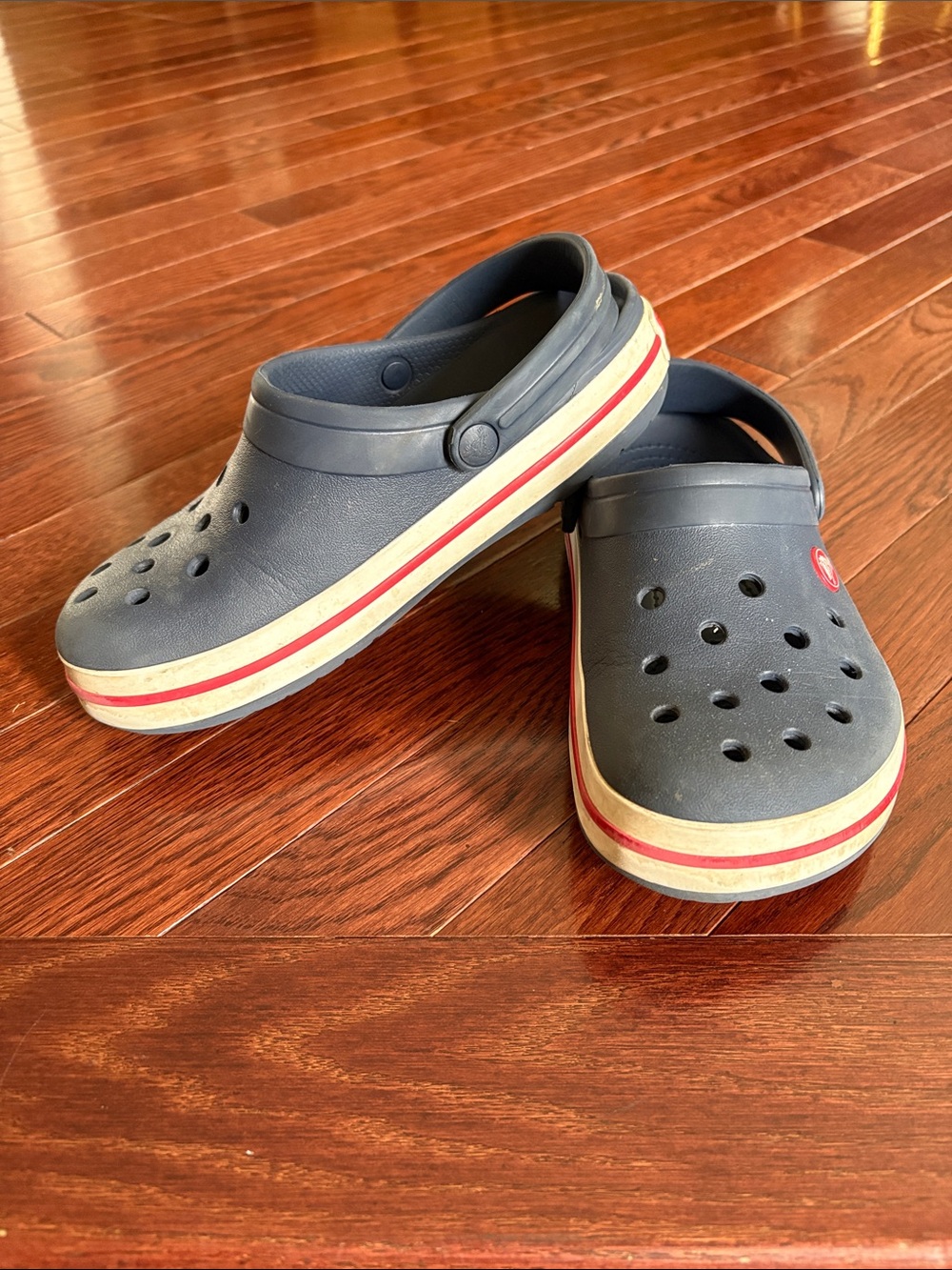 CROCS Kids Navy Clogs with Red and White Trim